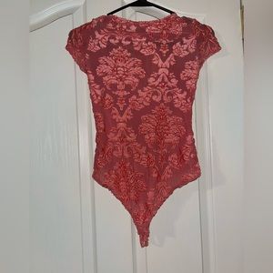 pink bodysuit with pattern